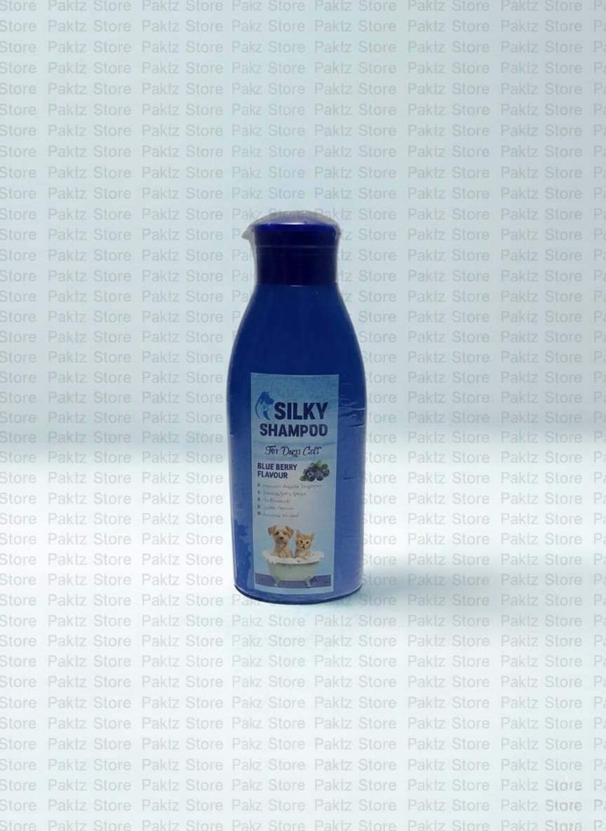 Blue bottle of Silky Shampoo on a light blue background